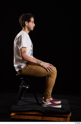 Whole Body Man White Shirt Trousers Slim Sitting Studio photo references